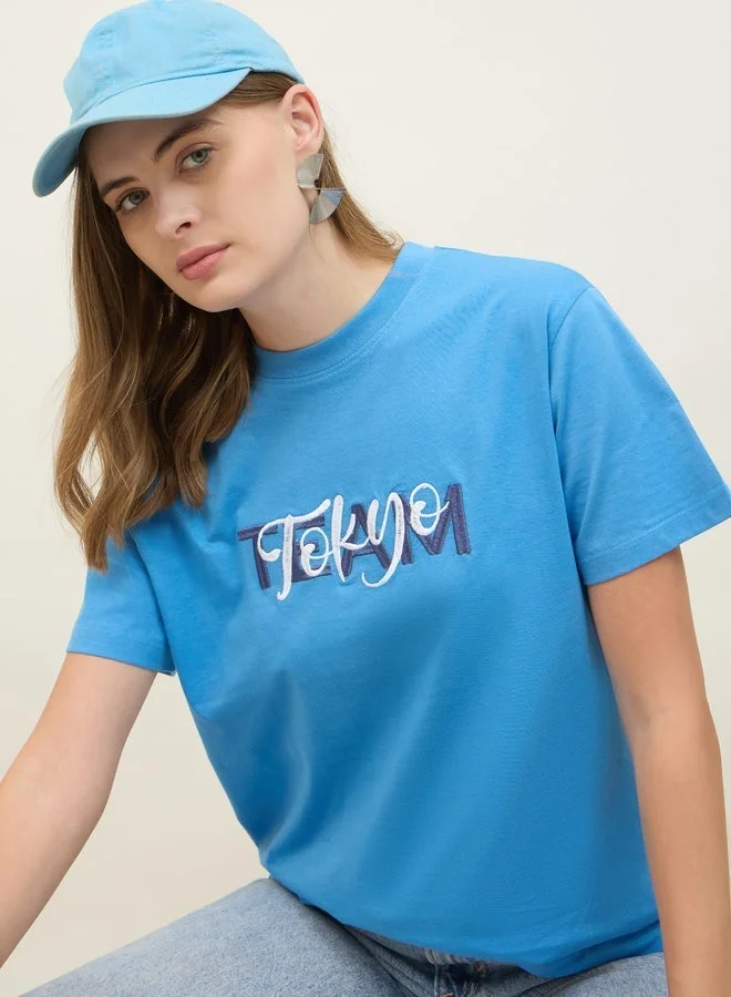 Styli Embroidered Slogan Boxy Fit Round Neck T-Shirt
